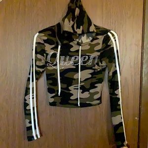 Tight fitted Camo cropped sweater. Extremely soft material.